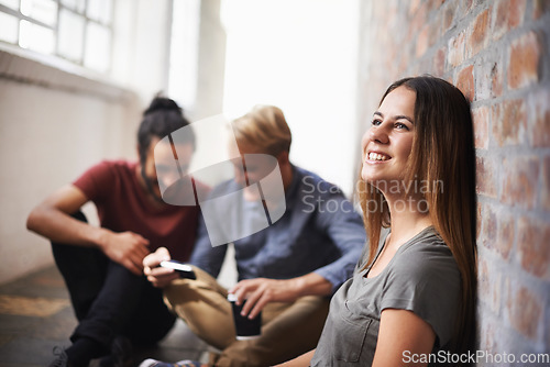 Image of University, thinking and woman with friends in hallway for education, knowledge and learning. College vision, academy scholarship and female student with ideas on campus for studying, class or school