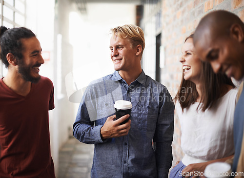 Image of Smile, group and friends in a lobby, conversation and bonding with happiness, joyful and cheerful. Diversity, men or woman with communication, hallway and young people chatting, talking or discussion