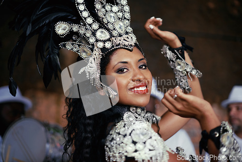 Image of Festival, carnival and dancer portrait of woman smile with music and party celebration in Brazil. Mardi gras, dancing or culture event costume with young female person with happiness from performance