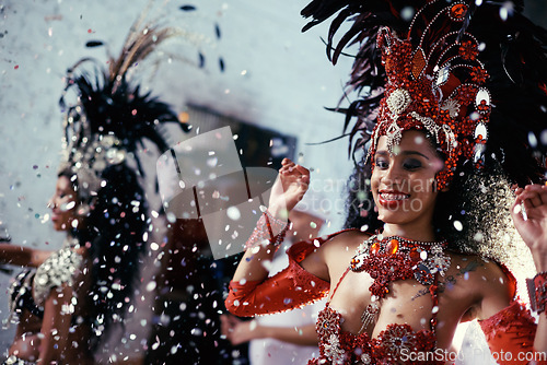 Image of Festival glitter, carnival dancer and woman smile with music and social celebration in Brazil. Mardi gras, dancing and culture event costume with a young female person with happiness from performance