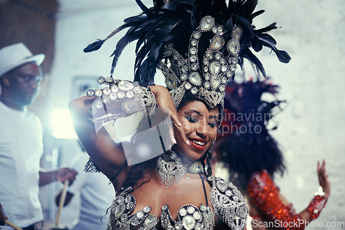 Image of Festival, carnival and dancer woman in samba with smile, music and party celebration in Brazil. Mardi gras, dancing or culture event costume with a young female person with happiness from performance