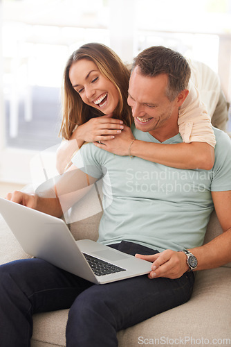 Image of Computer, laugh and happy couple on sofa with online men, website review or reading post on social media together. Funny, home and hug of mature partner, woman or people on laptop and smile for meme