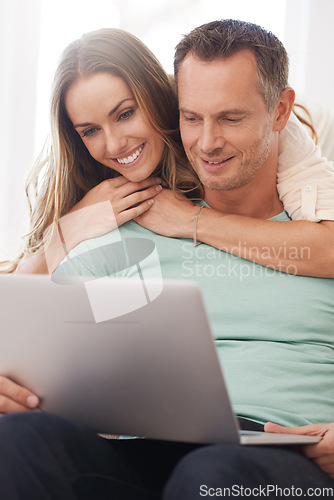 Image of Laptop, reading and happy couple with home internet for online planning, website review or check information together. Hug, love and affection of mature woman with partner or people on computer tech