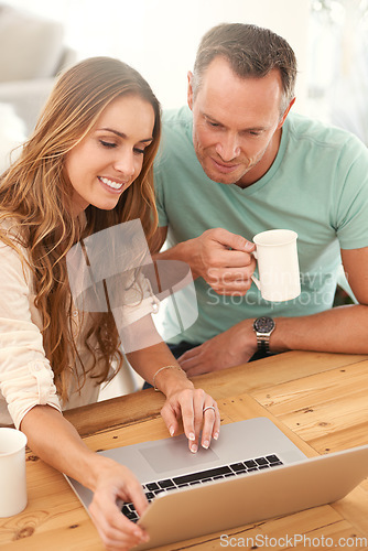 Image of Mature couple, home and laptop for online planning, digital review and check website or application for information. Happy woman or people scroll, reading or search on computer with coffee or tea