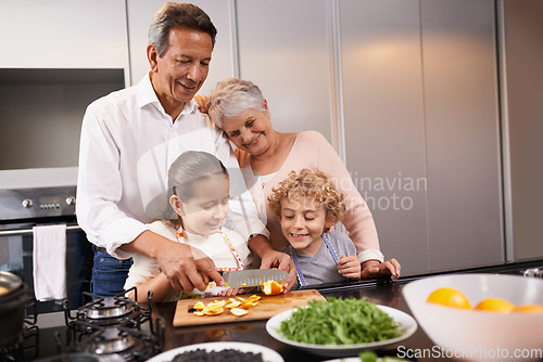 Image of Food, grandparents or happy children learning cooking skills for a healthy dinner with fruit or vegetables at home. Teaching kids, knife or grandmother with old man or diet meal nutrition in kitchen