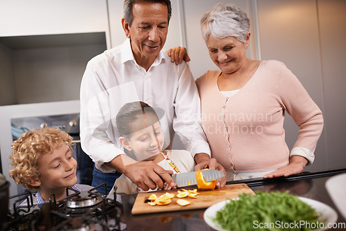 Image of Food, grandparents or happy kids learning cooking skills for a healthy dinner with fruit or vegetables at home. Teaching, child development or grandmother with old man or meal nutrition in kitchen