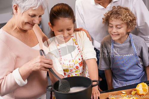 Image of Pot, grandparents or happy kids learning cooking skills for a healthy dinner with fruit or vegetables at home. Teaching, child development or grandmother with old man or food nutrition in kitchen