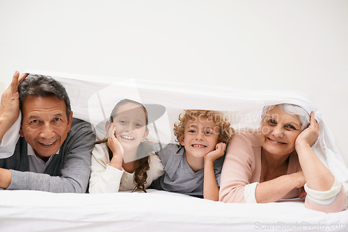 Image of Portrait, grandparents or happy kids in bedroom to relax together for bonding in Australia with love or care. Morning, faces or grandmother with children or mature old man to enjoy quality bed time