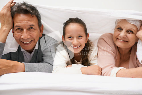 Image of Portrait, grandparents or happy child in bedroom to relax together for bonding in Australia with love or care. Morning, faces or grandmother with fun girl or old man to enjoy quality time on bed