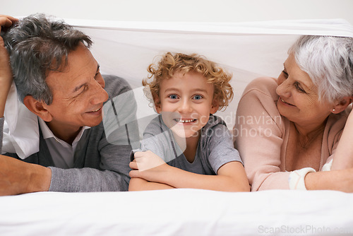 Image of Portrait, grandparents or happy kid in bedroom to relax together for bonding in Australia with love or care. Morning, faces or grandmother with funny cute boy or old man to enjoy quality bed time