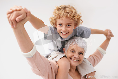 Image of Portrait, piggyback or grandma with a happy child or smile hugging with love in family home. Elderly grandmother, boy or fun old woman relaxing, bonding or playing together in retirement on holiday