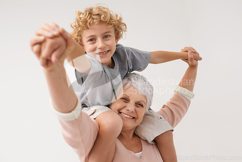 Image of Airplane, portrait and grandmother with child embrace, happy and bonding against wall background. Love, face and senior woman with grandchild having fun playing, piggyback and enjoying game together