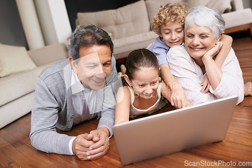 Image of Laptop, floor or grandparents with happy kids for movie streaming online subscription in retirement at home. Children siblings, relax or grandmother watching videos on internet with a senior old man