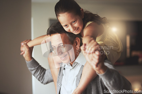 Image of Smile, piggyback or happy grandfather with a child playing or hugging with love in family home. Elderly grandpa, girl kid or old man relaxing, bonding or enjoying quality time together in retirement