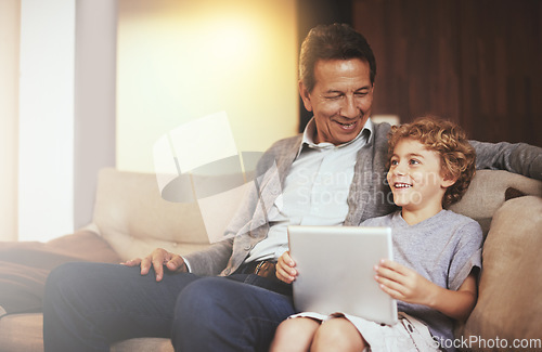 Image of Tablet, child or happy grandfather talking or smiling in conversation in retirement at home to relax. Grandparent or kid loves bonding or speaking to a mature old man or streaming movies together