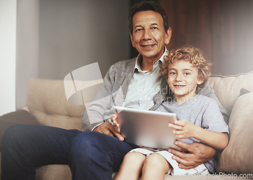 Image of Tablet, child or portrait of a happy grandfather streaming movie or film on online subscription at home. Relax, grandparent or child loves watching fun videos with a senior or mature old man on sofa