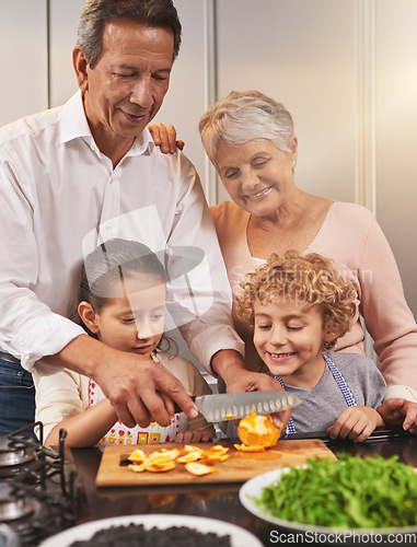 Image of Food, happy kids or grandparents teaching cooking skills for a healthy dinner with fruit or vegetables at home. Children learning, knife or grandmother with old man or diet meal nutrition in kitchen