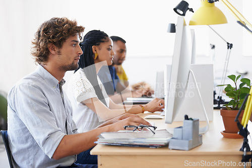 Image of Journalist, people or man typing on computer working on email, digital business or research project. Laptop, database or serious employees writing online blog reports or internet article with focus