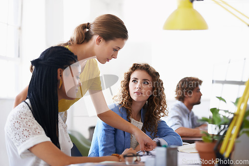 Image of Creative women, training and mentor planning a project in meeting or speaking with leadership in office. Woman coaching and staff team of employees for strategy or ideas in startup at the workplace