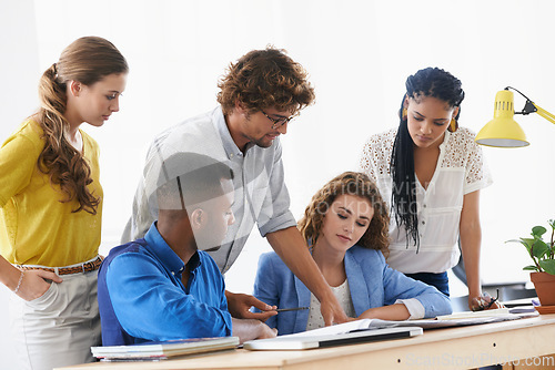 Image of Businessman, coaching and meeting with documents for planning, strategy or brainstorming at the office. Business people listening to coach ideas in teamwork for group project plan or training staff