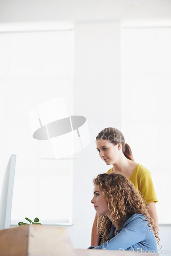 Image of Computer, women or manager training a worker in startup or research project in digital agency. Leadership, laptop or person helping, coaching or speaking of SEO data or online branding to employee