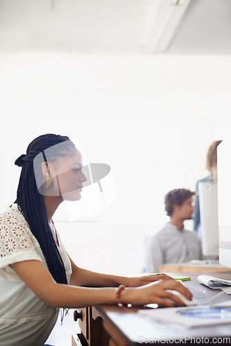 Image of Journalist, office or girl typing on computer working on email, business project or online research. Laptop, database or serious biracial woman writing blog reports or internet article with focus