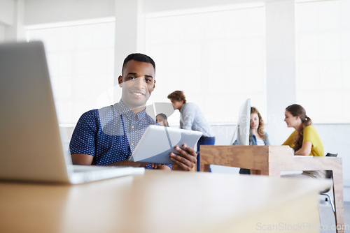 Image of Business, portrait or black man reading on tablet working on digital marketing or social media strategy in office. Smile, technology or happy employee researching online info or content on internet