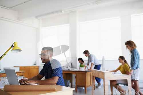 Image of Journalist, office or black man typing on laptop working on email, business project or online research. Computer, data or serious worker copywriting on blog, reports or internet article with focus