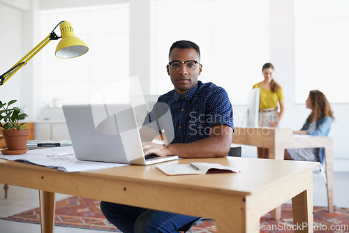 Image of Journalist, portrait or black man with laptop for research working on online business or copywriting. Computer, digital agency or focused worker typing for blog content, reports or internet article