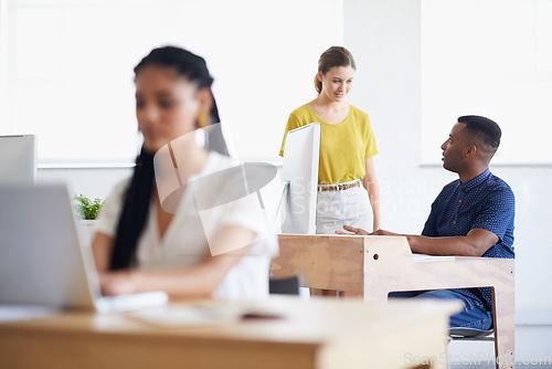 Image of Computer, black man or woman coaching a worker in startup or research project in digital agency. Leadership, laptop or manager helping, training or speaking of SEO data or online branding to employee