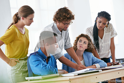 Image of Businessman, coaching and documents in team strategy, planning or training staff at office. Business people listening to coach or mentor in teamwork for group project, paperwork or plan at workplace