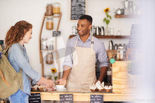 Image of Coffee shop, customer and waiter talking about service, hospitality or smile of a man. Happy woman buying tea at a restaurant, cafe or cafeteria of small business with barista, cashier or manager