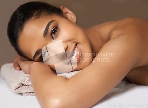 Image of Portrait of woman, smile or massage to relax for zen resting or wellness physical therapy in spa hotel. Face of happy girl in salon to exfoliate for body healing treatment or holistic detox therapy