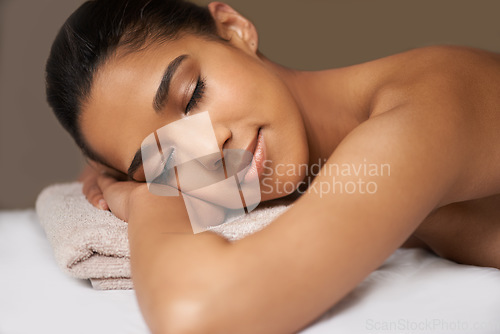 Image of Girl, sleeping or massage in spa to relax for zen resting or wellness physical therapy in luxury hotel resort. Calm woman in salon to exfoliate for body healing treatment or holistic detox therapy