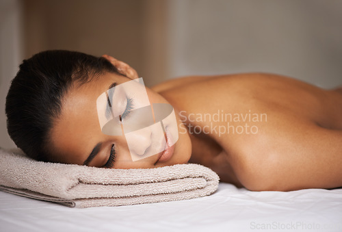 Image of Girl, massage or sleeping relax for zen resting, wellness or natural physical therapy in luxury hotel spa resort. Calm woman in salon to exfoliate for body healing treatment or holistic detox therapy