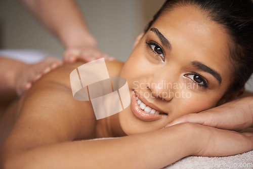 Image of Happy woman, portrait or massage in spa to relax for zen resting or wellness physical therapy in luxury resort. Face of girl smiling in salon for body healing treatment or natural holistic detox
