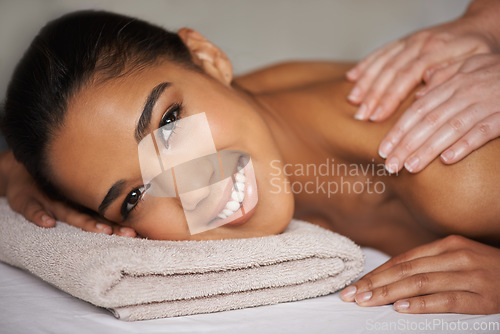 Image of Happy woman, portrait or hands for back massage in hotel to relax for zen resting or wellness physical therapy. Face of girl smiling in salon for body healing or natural holistic detox by masseuse