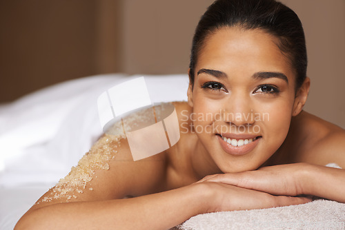 Image of Portrait of woman smiling, body scrub or massage to relax for zen resting or wellness physical therapy in spa. Smile or happy girl client in salon to exfoliate for luxury skincare treatment or beauty