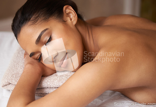 Image of Woman, sleeping or back massage in spa to relax for zen resting or wellness physical therapy in luxury resort. Calm girl in salon to exfoliate for body healing treatment or holistic detox therapy