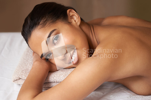 Image of Portrait of woman, happy or massage to relax for zen resting or wellness physical therapy in spa hotel. Face of girl smiling in salon to exfoliate for body healing treatment or holistic detox therapy