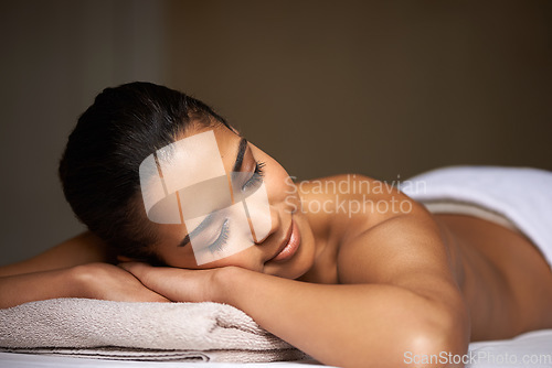 Image of Woman, sleeping or massage for client to relax for zen resting or wellness physical therapy in luxury resort. Calm girl in salon to exfoliate for body healing treatment or natural holistic detox