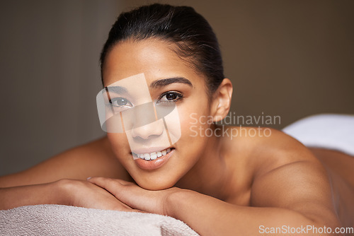 Image of Happy girl, beauty portrait or massage to relax for zen resting or wellness physical therapy in luxury spa resort. Face of woman smiling in salon for body healing treatment or natural holistic detox