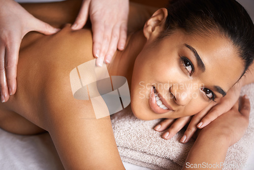 Image of Portrait of happy woman, hands or massage to relax for zen resting or wellness physical therapy in luxury resort. Face of girl smiling in hotel for body healing treatment or natural holistic detox