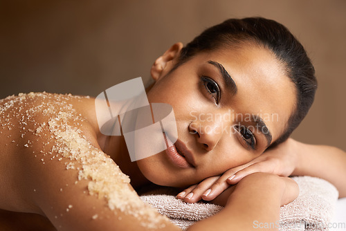 Image of Portrait, body scrub or massage for woman to relax for resting or wellness physical therapy in spa. Face of calm girl client in beauty salon to exfoliate for a healthy skincare healing treatment