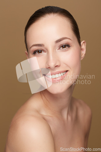 Image of Portrait, smile and woman with dermatology, cosmetics and beauty against a brown studio background. Face, female person and model with skincare, salon treatment and luxury with wellness and self care