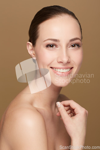 Image of Portrait, smile and woman with beauty, dermatology and grooming against a brown studio background. Face, female person and happy model with cosmetics, organic facial and salon treatment with skincare