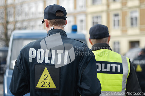 Image of Law enforcement, guard and security with police officer in city for peace, safety and authority. Emergency services, justice and protection with person in street for help, order and arrest