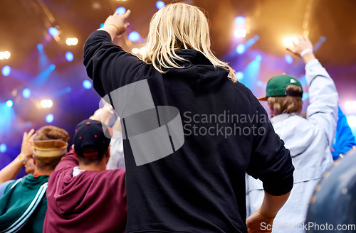 Image of Music, dance and party with crowd at festival for celebration, rave culture and performance. Carnival, summer and techno with audience of people at concert for laser light show, energy and dj event