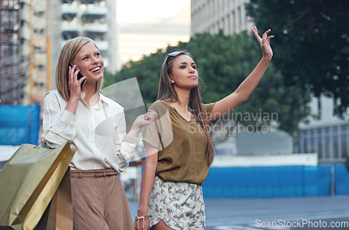 Image of Travel, urban and shopping people hail, stop or hand gesture for taxi, cab or car ride for city transportation journey. Phone call, traffic or fashion friends, women or customer for transport service