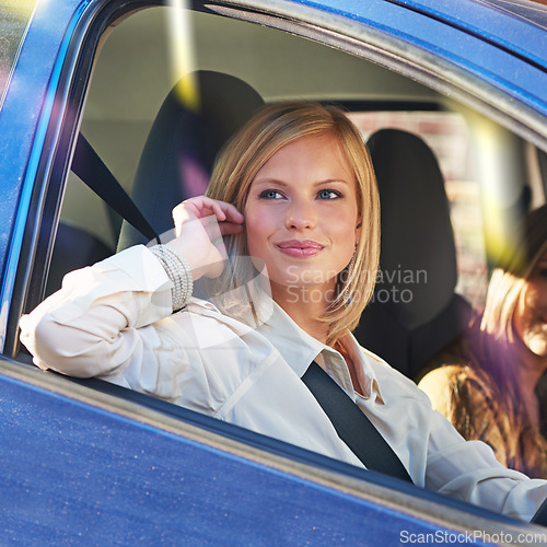 Image of Car road trip, travel and happy woman, driver or person on street journey, adventure or waiting in outdoor city traffic. Automobile transportation, window and female person driving in mobile vehicle